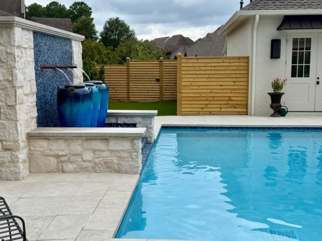 Custom wooden fence around pool Custom wooden fence around pool