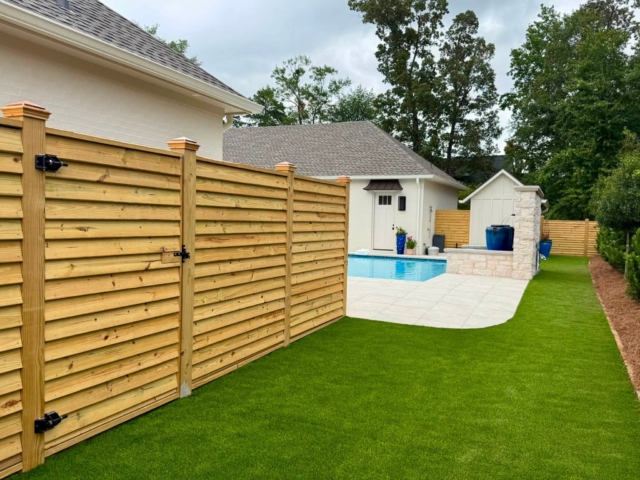 Custom wooden fence around pool Custom wooden fence around pool